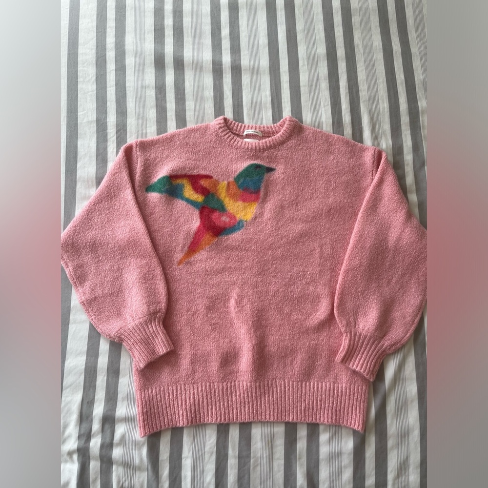 pink wool sweater with colorful bird